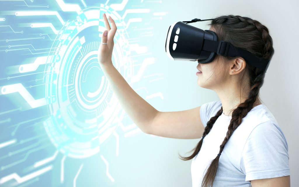 medium-shot-woman-wearing-vr-glasses-image